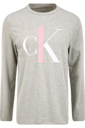 Pánské tričko NM2017E PGK šedá - Calvin Klein šedá XL