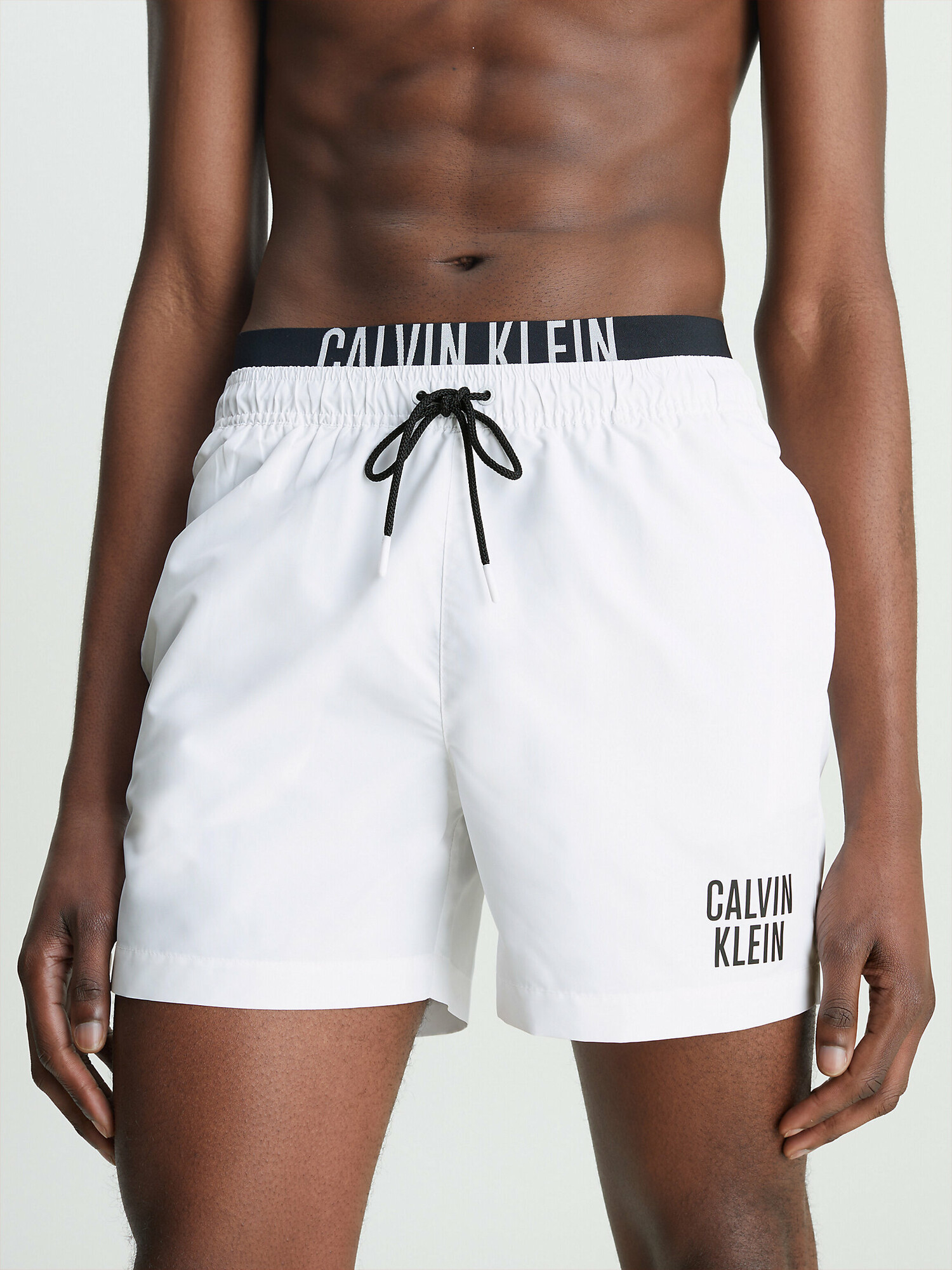 Pánské plavky Double Waistband Swim Shorts Intense Power KM0KM00740YCD bílá - Calvin Klein M