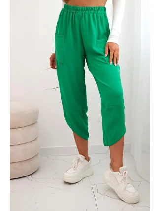 Kalhoty se širokými nohavicemi a kapsami zelený