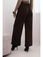 Dámské elegantní kalhoty s páskem a širokou nohavicí hnědé