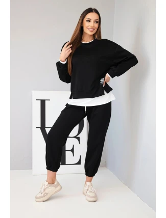 Dámský komplet s máslovou barvou, volnou mikinou a tepláky černý Dámský komplet s máslovou barvou, volnou mikinou a tepláky černý