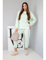 Dámský komplet s máslovou barvou, volnou mikinou a tepláky jasně mátová Dámský komplet s máslovou barvou, volnou mikinou a tepláky jasně mátová