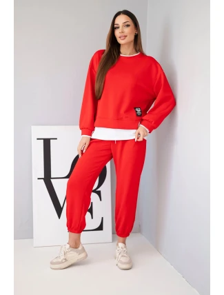 Dámský komplet s máslovou barvou s volnou mikinou a tepláky červený Dámský komplet s máslovou barvou s volnou mikinou a tepláky červený