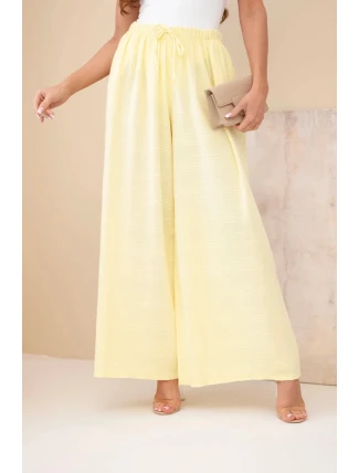 Dámské široké bavlněné kalhoty s gumičkou v pase žluté