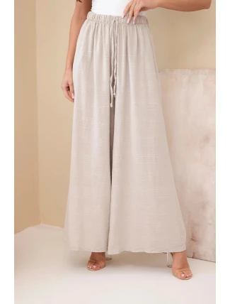 Dámské široké bavlněné kalhoty s gumičkou v pase béžové