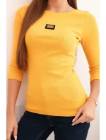 Dámská pruhovaná blůza s rukávem 3/4 a ozdobnou nášivkou hořčicová Dámská pruhovaná blůza s rukávem 3/4 a ozdobnou nášivkou hořčicová