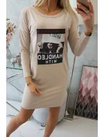 Rukojeť s béžovými šaty s potiskem