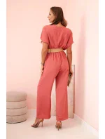 Kombinéza s ozdobným páskem v pase tmavě růžová