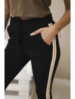 Bavlněné kalhoty se zlatým proužkem černý Bavlněné kalhoty se zlatým proužkem černý