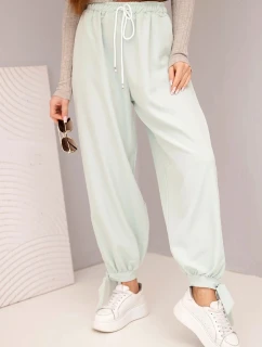 Dámské kalhoty se širokými nohavicemi a zavazováním dole tmavě mátové