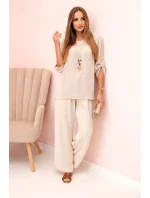 Dámský komplet s halenkou s náhrdelníkem a širokými nohavicemi béžový