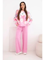 Dámský komplet z máslové viskózy s květinovým vzorem a širokými nohavicemi světle růžový