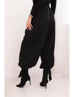 Dámské kalhoty s širokou nohavicí a zavazováním dole černé