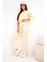 Dámská souprava Masełko s lampasy a volnou mikinou žlutý Dámská souprava Masełko s lampasy a volnou mikinou žlutý