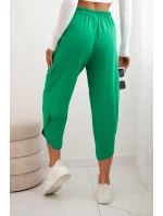 Kalhoty se širokými nohavicemi a kapsami zelený