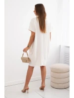 Šaty s kapsami a přívěskem světle béžová