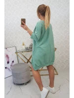 Šaty s potiskem a rozšířenou spodní částí tmavě mátové barvy Šaty s potiskem a rozšířenou spodní částí tmavě mátové barvy