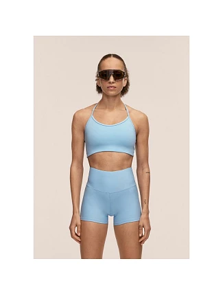 Sportovní podprsenka CASALL Sleek Strappy Sports Bra, modrá barva Sportovní podprsenka CASALL Sleek Strappy Sports Bra, modrá barva