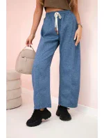 Máslové kalhoty zavazované v pase džínový melír Máslové kalhoty zavazované v pase džínový melír