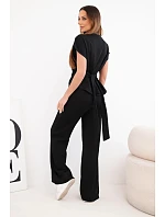 Dámský komplet z měkkého úpletu s halenkou s krátkým rukávem a kalhotami se širokými nohavicemi černý Dámský komplet z měkkého úpletu s halenkou s krátkým rukávem a kalhotami se širokými nohavicemi černý