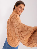 Broskvový oversize svetr s kabely