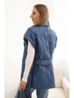 Dámská prošívaná vesta s páskem a širokým límcem tmavě džínová Dámská prošívaná vesta s páskem a širokým límcem tmavě džínová