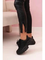 Dámské kalhoty z eko kůže s vázáním a rozparkem na nohavici černé