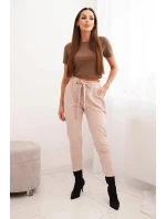 Dámské kalhoty z bavlny s vázáním v pase a zúženými nohavicemi béžové