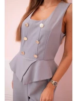 Dámská kombinéza bez rukávů s širokými nohavicemi a ozdobnými knoflíky šedý Dámská kombinéza bez rukávů s širokými nohavicemi a ozdobnými knoflíky šedý