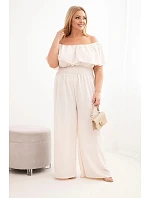 Dámská kombinéza Plus Size s bardot výstřihem, volánem a širokými nohavicemi béžový