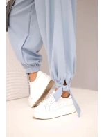 Dámské kalhoty s širokými nohavicemi a zavazováním dole džínové modré