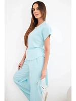 Dámský komplet z materiálu masełko s krátkým rukávem a kalhotami se širokou nohavicí mentolový Dámský komplet z materiálu masełko s krátkým rukávem a kalhotami se širokou nohavicí mentolový