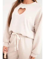 Dámský komplet máslo s výřezem ve tvaru srdce béžový