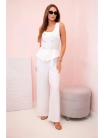 Dámská kombinéza bez rukávů s širokými nohavicemi a ozdobnými knoflíky ecru Dámská kombinéza bez rukávů s širokými nohavicemi a ozdobnými knoflíky ecru