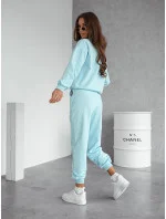 Světle modrý dámský teplákový komplet - mikna se stojáčkem a kalhoty (82162) Světle modrý dámský teplákový komplet - mikna se stojáčkem a kalhoty (82162)