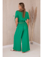 Dvoudílný komplet kalhotové halenky zelený
