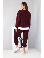 Dámská souprava s máslovou volnou mikinou a tepláky švestková