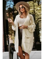 628-1 Módní oversize svetr s ozdobnou broží a praktickými kapsami - béžový