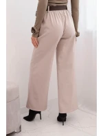 Dámské elegantní kalhoty s páskem a širokými nohavicemi béžové