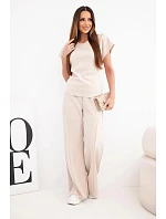 Dámský měkký komplet s halenkou s krátkým rukávem a kalhotami se širokou nohavicí béžový Dámský měkký komplet s halenkou s krátkým rukávem a kalhotami se širokou nohavicí béžový