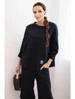 Dámská tepláková souprava z silnějšího materiálu se širokými nohavicemi granátová