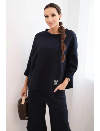 Dámská tepláková souprava z silnějšího materiálu se širokými nohavicemi granátová