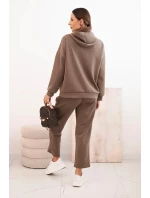 Komplet dámský máslový mikina s kapucí a kalhoty s páskem fango Komplet dámský máslový mikina s kapucí a kalhoty s páskem fango