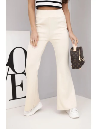 Dámské kalhoty máslo s rozšiřující se nohavicí béžové