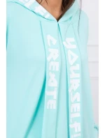 Oversize mátové šaty s kapucí Oversize mátové šaty s kapucí