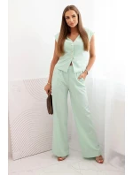 Dámský komplet s vestou a širokými kalhotami tmavá máta