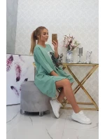 Šaty s potiskem a rozšířenou spodní částí tmavě mátové barvy Šaty s potiskem a rozšířenou spodní částí tmavě mátové barvy