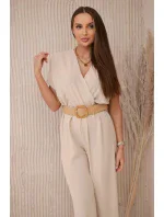 Kombinéza s ozdobným páskem v pase béžová Kombinéza s ozdobným páskem v pase béžová