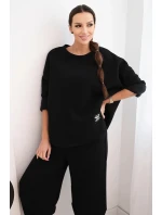 Dámský teplákový komplet z silnějšího materiálu se širokými nohavicemi černý