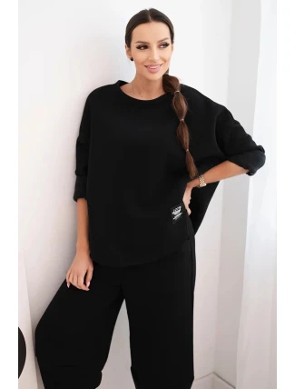 Dámský teplákový komplet z silnějšího materiálu se širokými nohavicemi černý